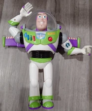 Toy Story Buzz Lightyear Space Ranger 12"  needs new batteries, rest works