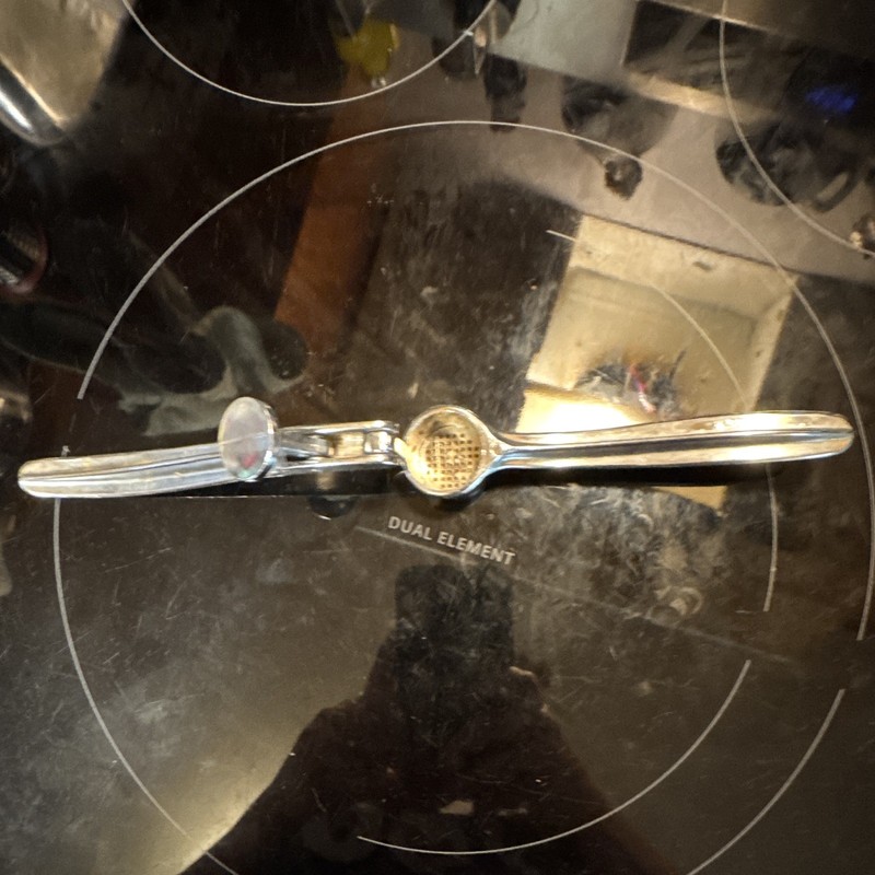 Vintage Metallic Garlic Press Tool with Dual Functionality 
