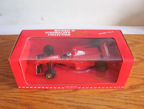 Minichamps skala 1:18 Ferrari F 310B, M. Schumacher [1997]. - Zdjęcie 1 z 2