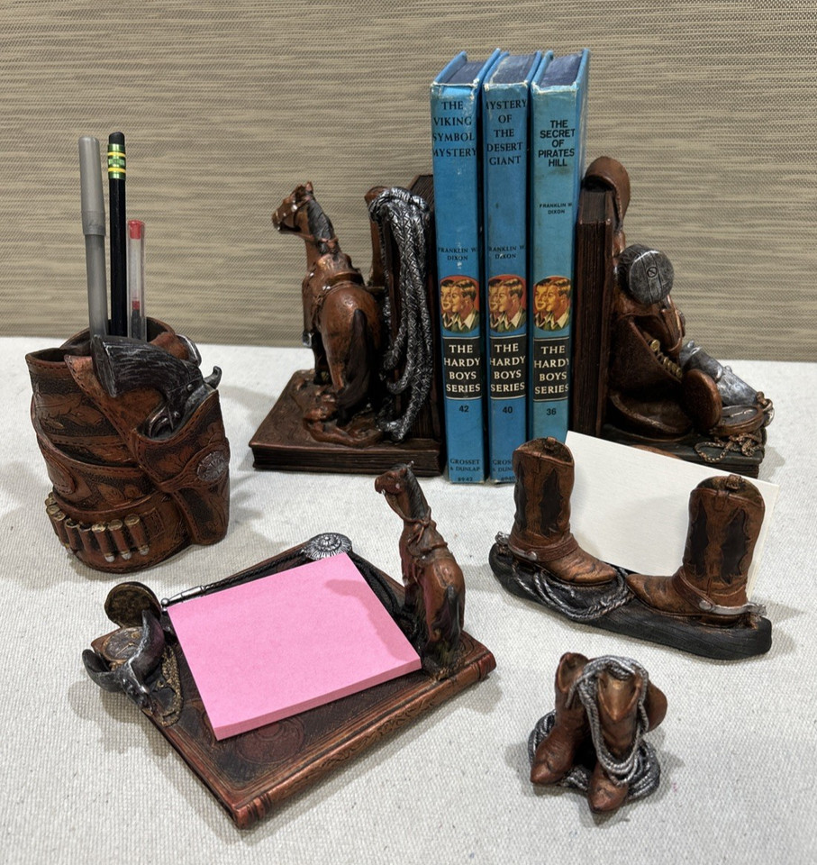 A complete Figi Western Heritage cowboy-themed desk set with bookends — the kind of dusty-ranch Americana that looks incredible on a leather-topped desk.