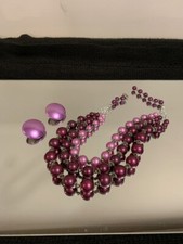 VINTAGE 3 STRAND PURPLE BEADS AND CLIP ON EARRINGS SET IN EXCELLENT CONDITION.