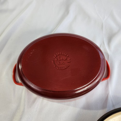 Le Creuset Cast Iron 31 Oval Dutch Oven with Lid Cerise Red 6-3/4 Qt. - Picture 11 of 12