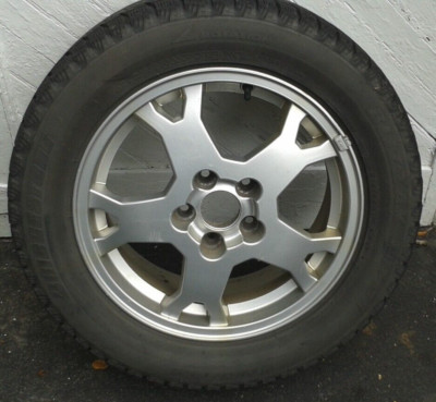 Wheels/ Rims 6.5Jx16H2 IS 49 w/ Snow Tires Blizzak REVO1 215/55R16 93Q