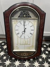 Rhythm Small World Sign of Times Zodiac Magic Sound & Motion Clock 4MH744NR