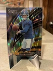 2025 Panini Select - Club Level Jaxson Dart #293 Black & Gold Shock Prizm (RC)