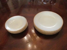 Vintage Seven Saucers and Eight Small Plates with Golden Rim