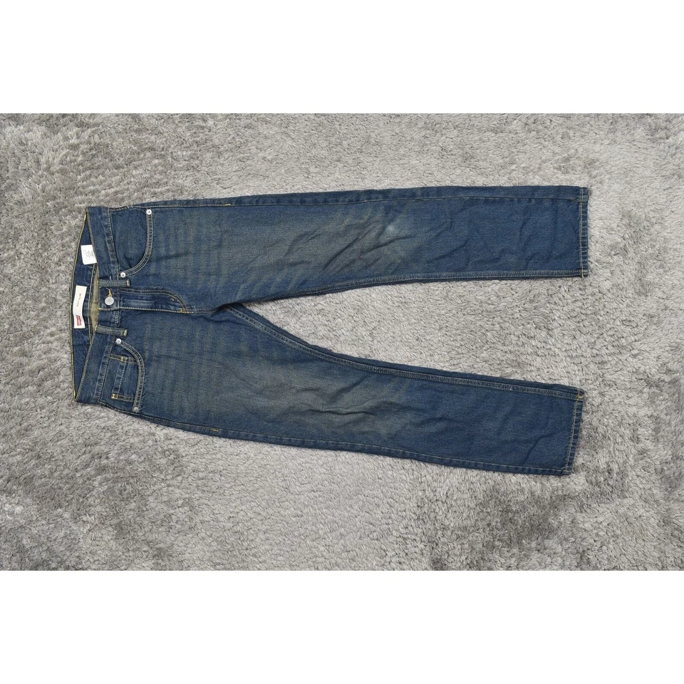 Jeans rectos azules Levi's unisex niños talla 16 28x28 usados 511 calce ajustado Foto 4 de 4