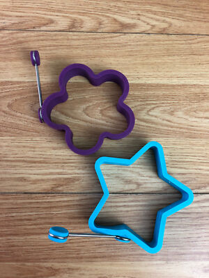 2 x farbige Silikon Eierringe Stern und Blume 