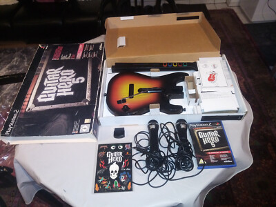 Guitar Hero 5 mit OVP, Gitarre, Wireless Adapter und 2 Mikrofone Zubehörpaket