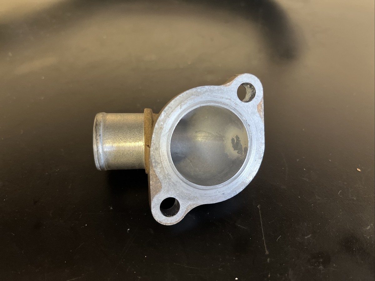 2003-2006 Kawasaki KFX 400 Thermostat , Housing Cover , and Hose