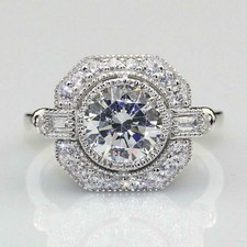 Halo Style Women's Wedding Ring With 2.13 CT Simulated Round Cut Shiny Sapphire