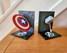 A unique hand-painted PAIR of Avengers Bookends, Captain America Shield and Thor