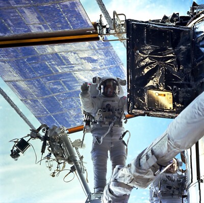 SM3A: A Radio Transmitter is being replaced HUBBLE MISSION 12X12 PHOTOGRAPH