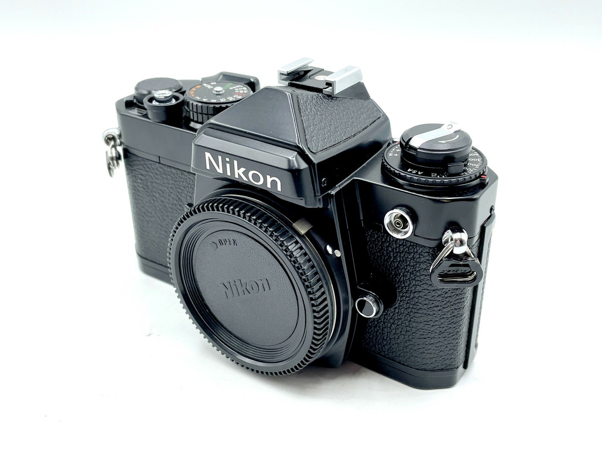 Black Nikon FE SLR film camera body; no lens - Rare Beauty Black Nikon FE SLR film camera body; no lens - Rare Beauty