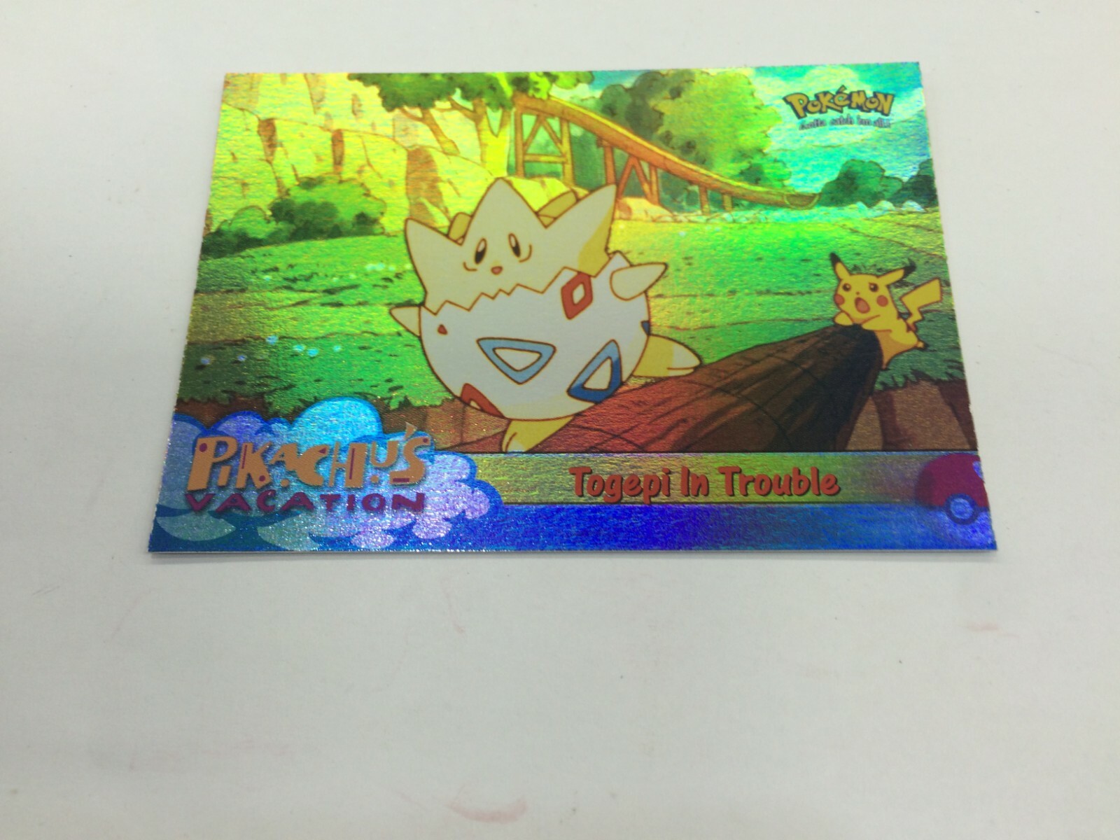 1999 TOPPS POKEMON FIRST MOVIE TRADING CARD HOLOFOIL CARD #45 TOGEPI IN TROUBLE