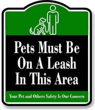 Pets Must Be On A Leash In This Area BLACK Aluminum Composite Sign