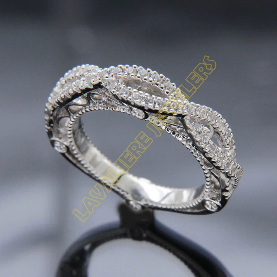 Alianza de boda infinita de diamantes simulados redondos de 0,60 quilates de plata 925 talla 6,5 Foto 4 de 4