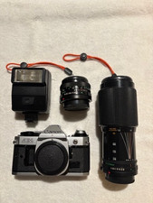 Canon AE-1 Camera, 50mm "Nifty-Fifty" lens, 200mm Zoom lens, Speedlite 177A