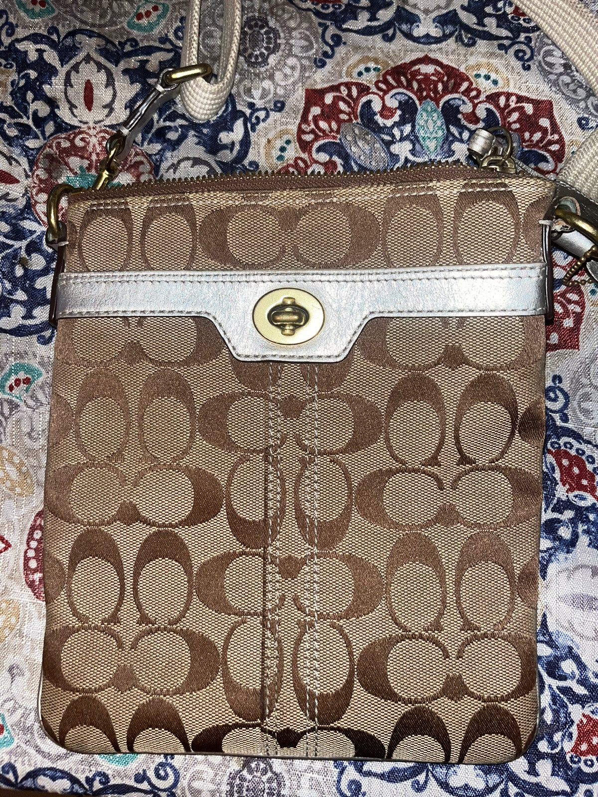 Authentic Coach tan canvas crossbody purse. Gem