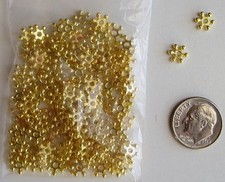 NEW--6 MM SHINY GOLDTONE DAISY SPACER BEADS-NEW-PKG OF 200-HOLE SIZE 0.5MM