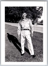 Vtg B&W Snapshot Smiling US Soldier Uniform Garrison Cap Outdoors Road 1950s