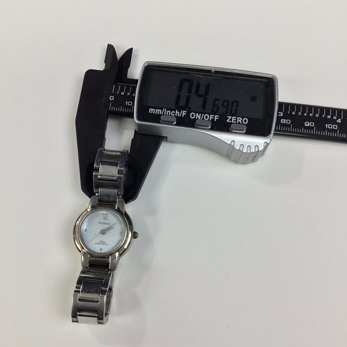 Armitron NOW Silver tone Comes Ladies Round Dress Watch - Working Well - Picture 10 of 11