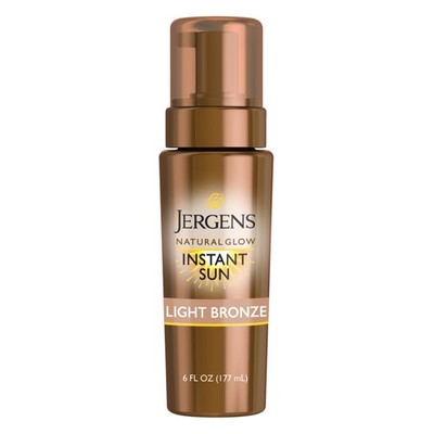 Instant sunless tanning mousse for natural glowing skin