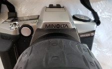 Minolta maxxum 5 With 2 Lens Bag And A Couple Other Parts Pictured