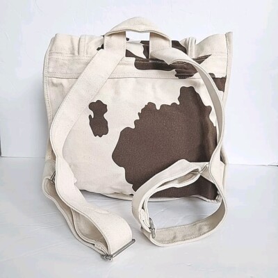 Baggu Cow Print Cotton Canvas Flap Top Adjustable Strap Backpack BagguDrawstringBackpack-  main image 4