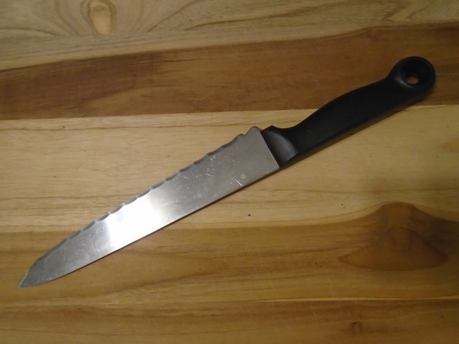 J.A. Henckels International 10386200 8" serrated chef's knife. Spain