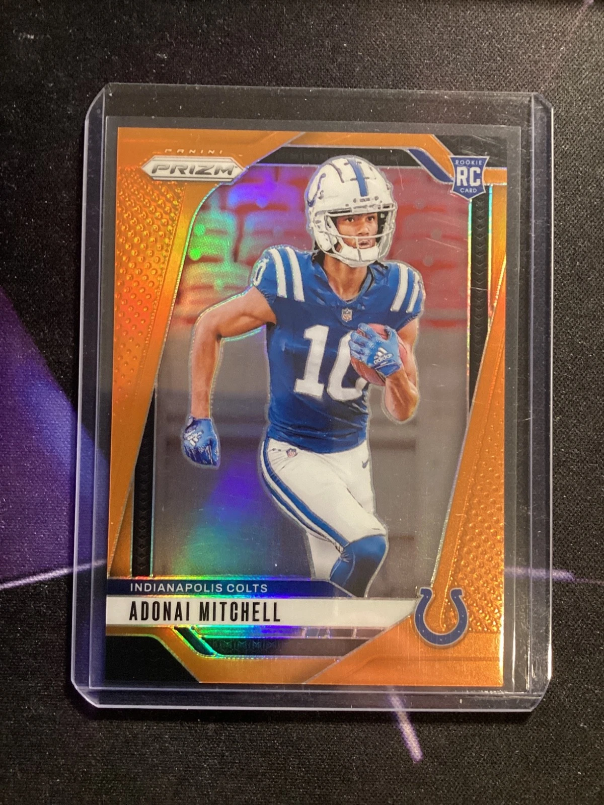 2024 Panini Prizm - Rookies Adonai Mitchell #303 Orange Prizm /249 (RC)