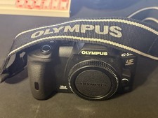 Olympus E-510 Camera with 2 Lenses And Their Covers, Battery, Charger And Manual