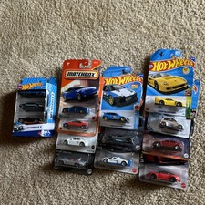 A Lot Of 11 Hot Wheels And Matchbox Cars