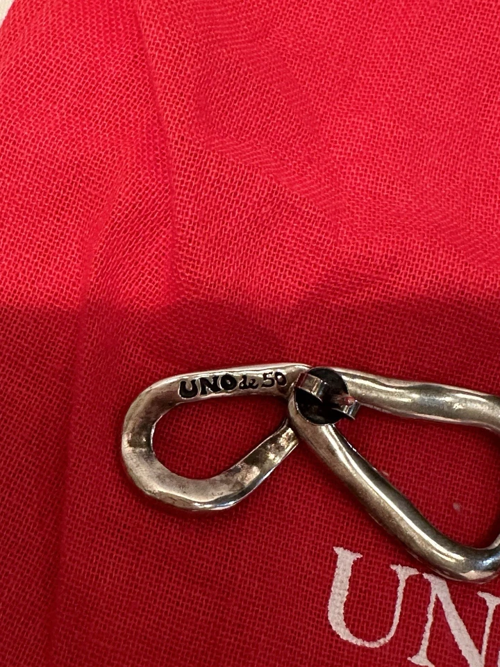 Pendientes de aro Uno de 50 simples plateados para mujer Foto 3 de 4