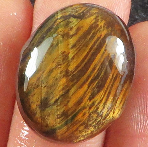 Oeil de tigre en cabochon ovale de 29,81Cts - Foto 2 di 3