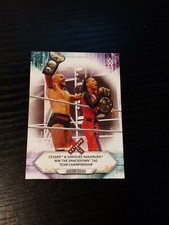 2021 Topps WWE #90 Cesaro & Shinsuke Nakamura Win SmackDown Tag Team Championshi