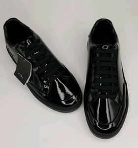 black shiny trainers