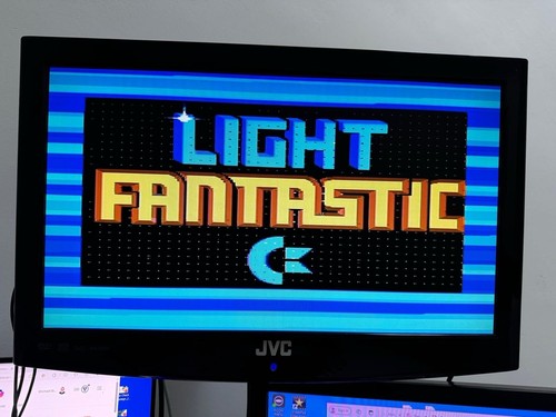 Vintage Commodore 64C Light Fantastic z pistoletem i grami w pudełku - przetestowany i działający - Zdjęcie 20 z 21