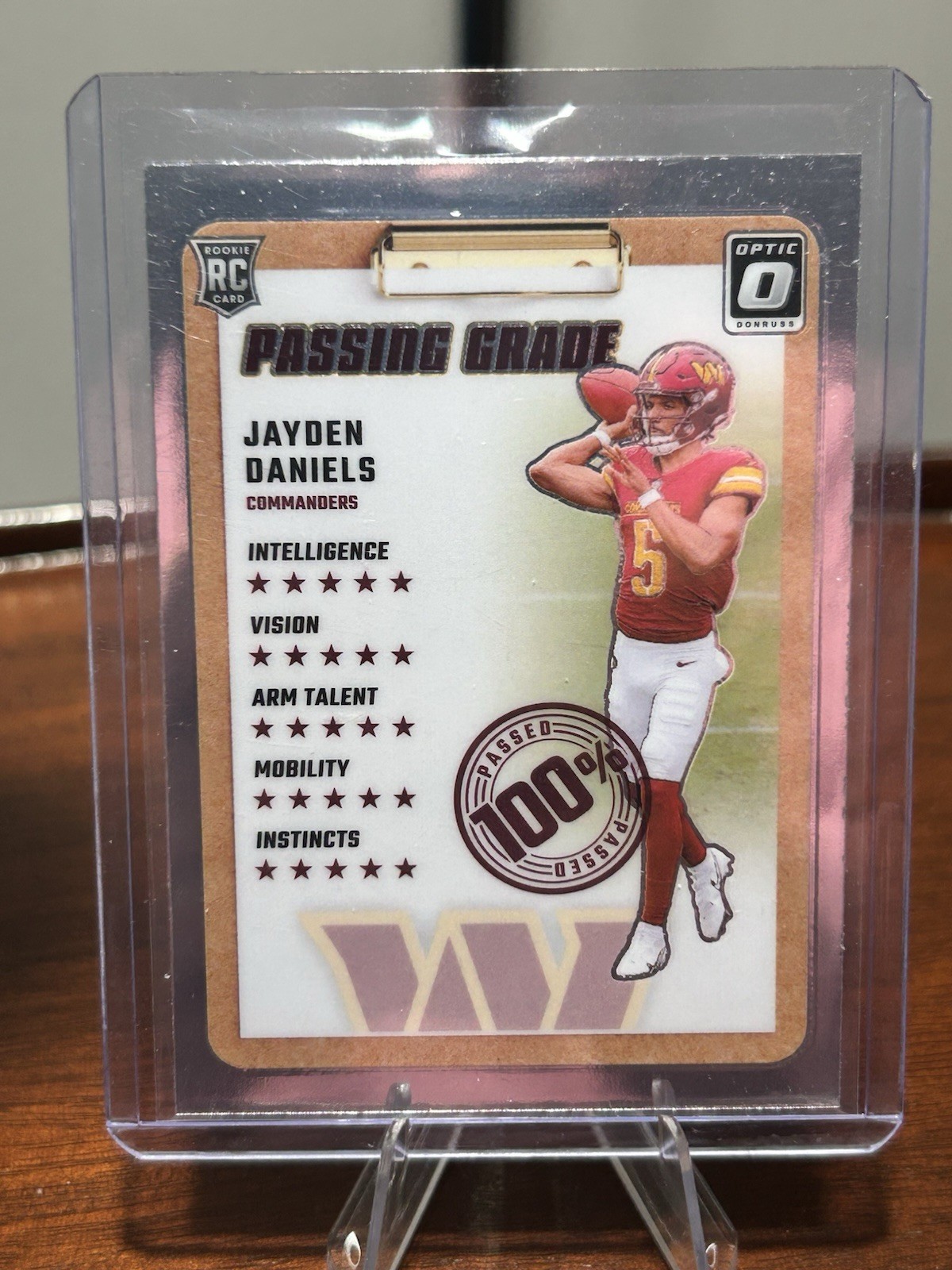 2024 Panini Donruss Optic - Passing Grade Jayden Daniels #2 (RC)