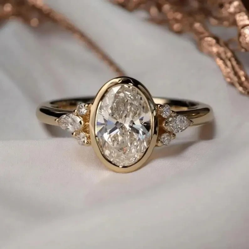 3Ct Oval Cut Simulated Diamond Bezel Set Ring In 14K Yellow Gold Silver Plated