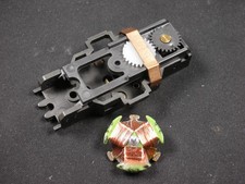 A Nice NOS AFX chassis and gearplate w/6 ohm arm and static epoxy balance.