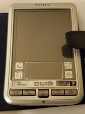 Sony Clie PEG-SJ30/U Silver Personal Entertainment System Organizer - For Parts