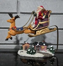 Christmas Decor Spring/Bobbing Santa in Sleigh Flying Over Town, Whimsical