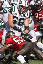 Guard Alan Faneca New York Jets blocks against the Tampa Bay Bucca- 2009 Photo
