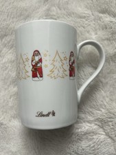 Lindt Weihnachtstasse Weihnachtsmann Tannen Schriftzüge Lindt NEU !