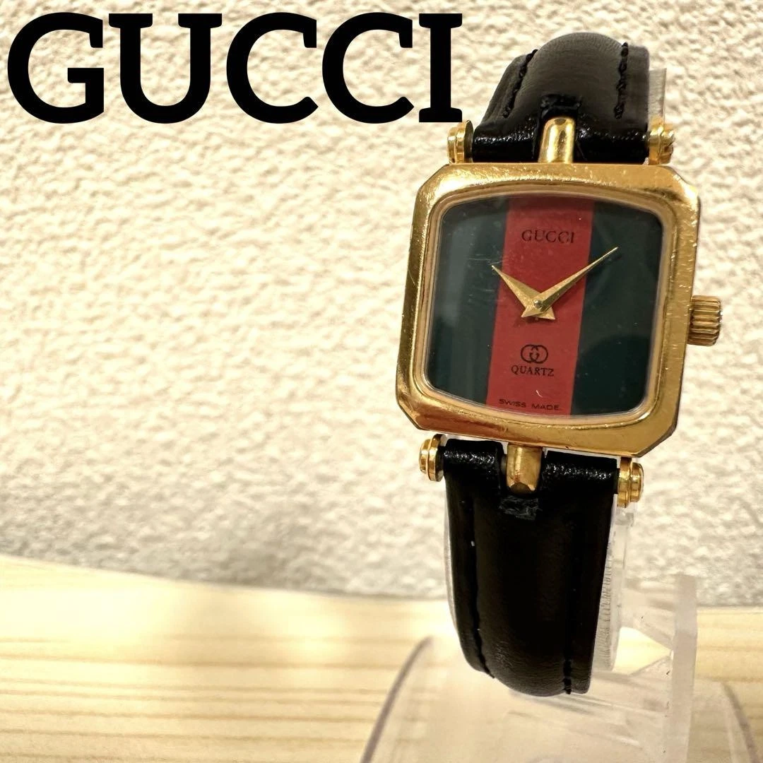 Montre GUCCI ligne Sherry, piles neuves, ceinture neuve, fonctionne.