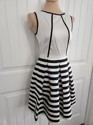 mixed media fit & flare dress The Selena Mixed Media Taupe Fit & Flare Mini Dress main image 0