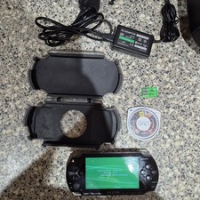 Sony PSP-1003 Black PAL Wi-Fi Handheld Bundle Charger Case & Game