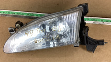 1998-2000 Toyota Corolla Front Left Driver Side Headlight 8115002050 Oem.