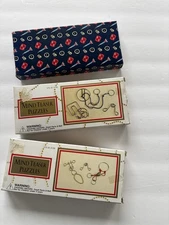 Mind Teaser Metal Puzzles 1997 Set Of 3 different metal puzzles